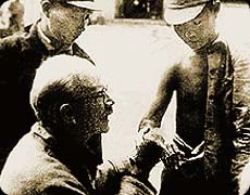 Bethune treating a patient in China